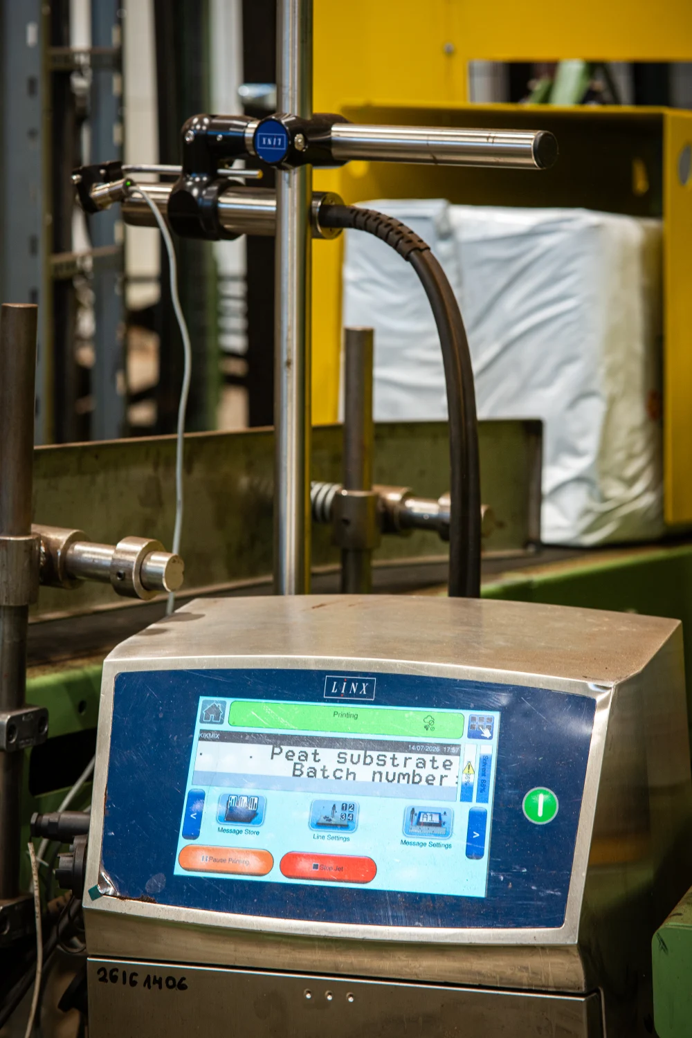 Batch-number printer control on the ASB Professional growing media production line
